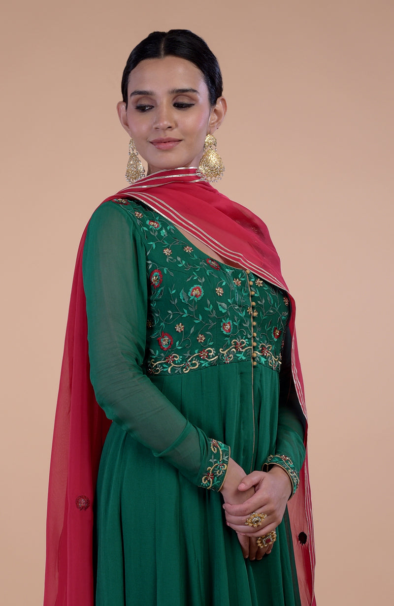 Emerald Green-Red Anarkali Set with Resham & Zardozi Embroidery Talking Threads Emerald Green-Red Anarkali Set with Resham & Zardozi Embroidery Talking Threads