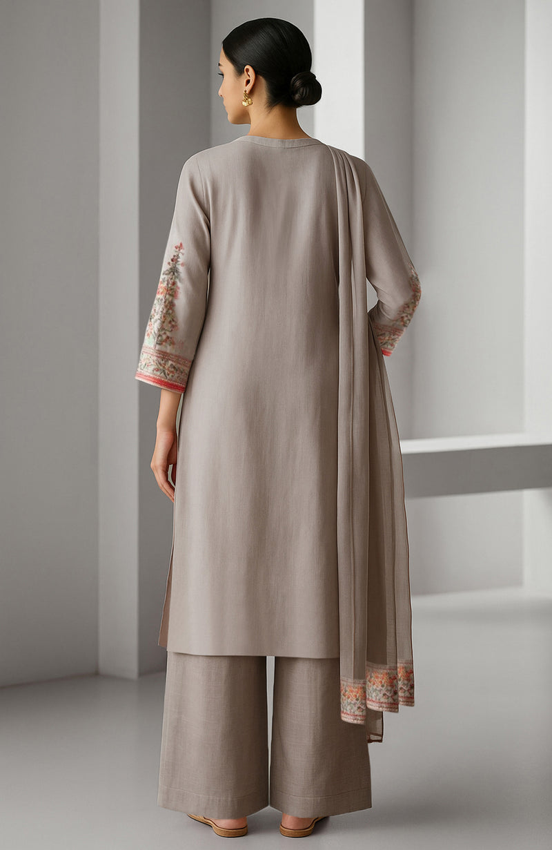 Taupe beige embroidered kurta set with wide-leg trousers and sheer dupatta.