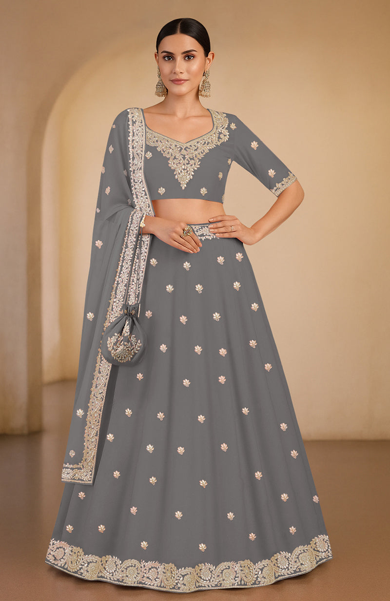 A grey lehenga set with gota patti and zardozi embroidery.