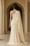 One-shoulder ivory couture column gown with embroidered paisley motif.