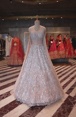 LAILA- Silver Champagne Hand Embroidered Lehenga Set With Cape Sleeves
