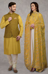 On Her: Mango Mojito Gota Patti & Zari Anarkali Set | On Him: Sunglow Yellow Pintuck Kurta & Mustard Waistcoat Jacket Set