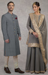 On Her: Grey Gota Patti & Zardozi Embroidered Sharara Set | On Him:  Steel Grey Silk Achkan Sherwani Set