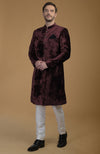 On Her: Pomegranate-Mulled Grape Raw Silk Hand Embroidered Jacket Set With Dupatta | On Him: Maroon Silk Velvet Sherwani Set